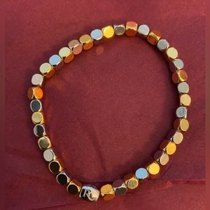 Rustic Cuff Elastic Bracelet Silver and Gold beads.